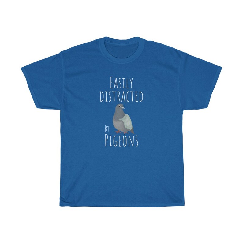 May include: A royal blue t-shirt with the text "EASILY DISTRACTED BY PIGEONS" and a cartoon image of a pigeon.