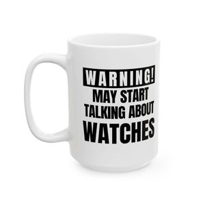 May include: White ceramic mug with a black rectangular text box that reads "WARNING! MAY START TALKING ABOUT WATCHES". The mug has a large handle and is suitable for hot or cold beverages.