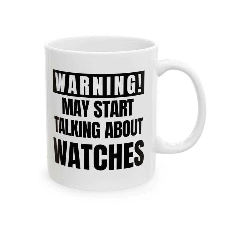 May include: White ceramic mug with a black handle. The mug features the text "WARNING! MAY START TALKING ABOUT WATCHES" in a bold, black font. The mug is designed for watch enthusiasts.