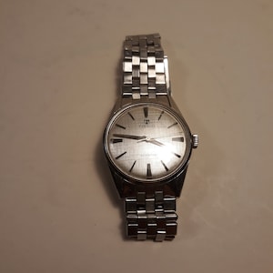 Tissot watch with link called gay link, guarrantied function when arrives to costumer