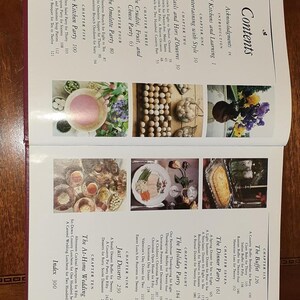May include: A book cover with a colorful image of a table setting with food and drinks. The book title is "Entertaining with Style" and the subtitle is "Cocktails and Hors d'Oeuvres".