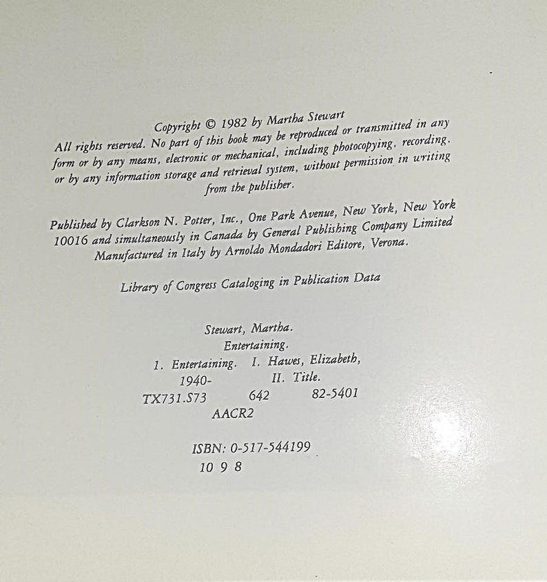 May include: Copyright information for a book titled "Entertaining" by Martha Stewart. The book was published in 1982 by Clarkson N. Potter, Inc. and General Publishing Company Limited. The ISBN is 0-517-544199.