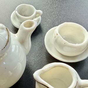 Childs tea set, doll house miniature, white and gold coffee service