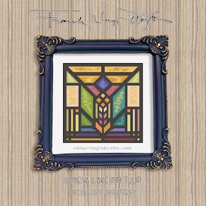 Puede incluir: Un patrón de punto de cruz enmarcado con un diseño geométrico colorido, que recuerda a las vidrieras. La obra de arte está en un marco azul oscuro adornado con detalles dorados. El texto "Geneva Lake Inn Tulip Cross Stitch Pattern" es visible.