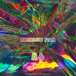 May include: A sheet of iridescent rainbow film in A4 size. The film is crinkled and reflects light in a variety of colours.