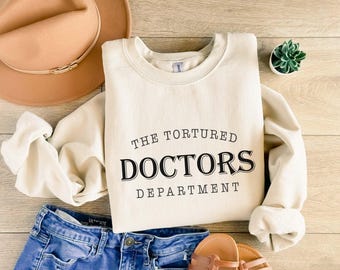 Camiseta del Departamento de Médicos Torturados, Sudadera con capucha de Doctor