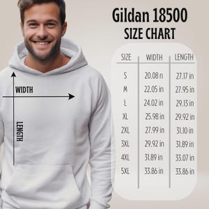 May include: White Gildan 18500 hoodie with a size chart. The chart shows measurements in inches for sizes S through 5XL, including width and length. A person is wearing the hoodie.