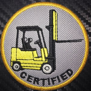 May include: A gray and yellow embroidered patch with a forklift and the word "CERTIFIED" in black.