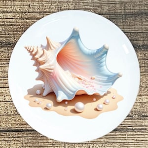 May include: A decorative white plate featuring a seashell design. The seashell is rendered in soft pastel colors of pink, blue, and white, with a scattering of pearls on a sandy base. The plate is round and has a glossy finish.