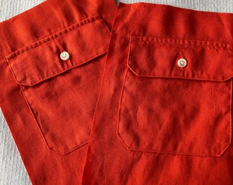 pair of patch pockets, red/orange fabric pockets, linen pockets