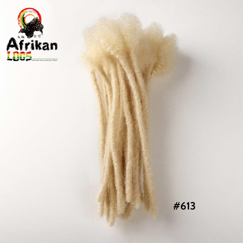 May include: A bundle of blonde dreadlocks, with a textured, natural appearance. The hair extensions are arranged vertically against a white background. The product is labeled with the text "Afrikan Loox" and the number "#613".