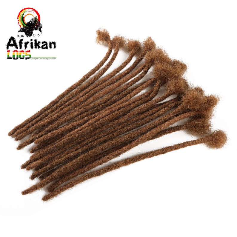 May include: A bundle of brown dreadlocks, arranged on a white background. The dreadlocks are a medium brown color and appear to be made of synthetic hair. The logo "Afrikan Loox" is visible in the upper left corner.