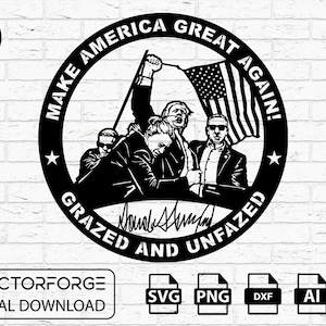 May include: Black and white silhouette of four people holding an American flag with the text "Make America Great Again!" and "Grazed and Unfazed" around the outside of the circle. The signature "Donald J. Trump" is visible at the bottom of the circle.