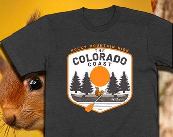 Squirrel In a Canoe, Paddling along the Mountain Lake | The Colorado Coast Logo T-shirt | Shirts are UNISEX