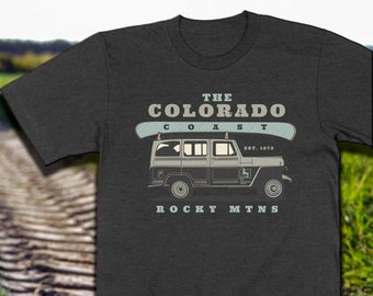 Land Willy Truck with Canoe | Rocky Mountain | Trending Colorado Gifts & Souvenirs | Rocky Mountain Rover | UNISEX SHIRT