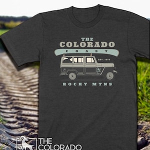 Land Willy Truck with Canoe | Rocky Mountain | Trending Colorado Gifts & Souvenirs | Rocky Mountain Rover | UNISEX SHIRT