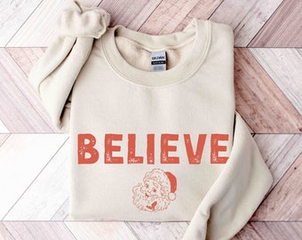 Retro Christmas Sweatshirt Womens Christmas Shirt Vintage Santa Believe Holiday Sweater Christmas Crewneck Minimal Ugly Christmas Sweater