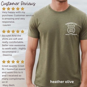 May include: A heather olive t-shirt with a white graphic of a police badge that says "Thermostat Police Protect & Conserve". The shirt is modeled on a person. Customer reviews are shown on the left side of the image.