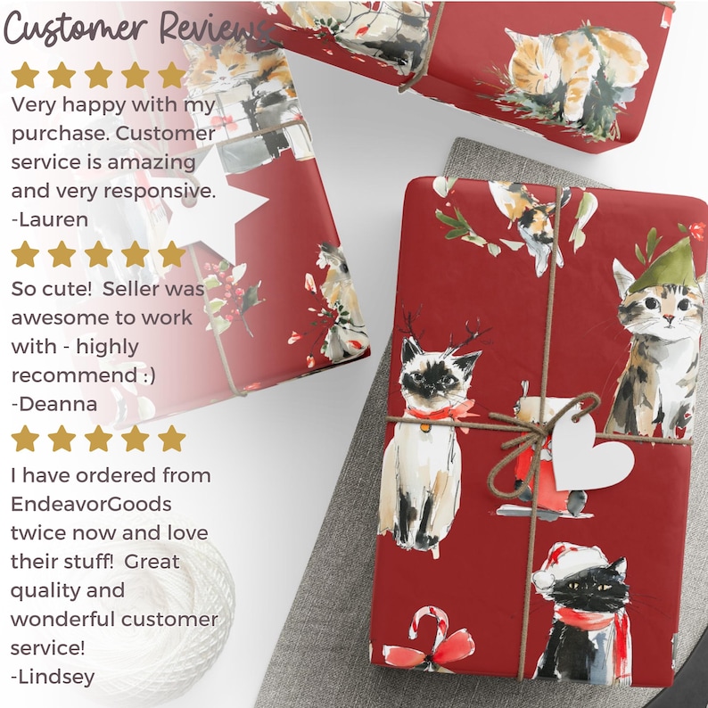 May include: Red wrapping paper with a cat-themed design. The paper features illustrations of cats wearing festive accessories. The wrapped gifts are tied with twine and a heart-shaped tag. Customer reviews are visible in the image.