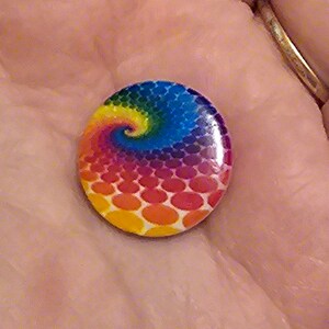 Rainbow swirl minder