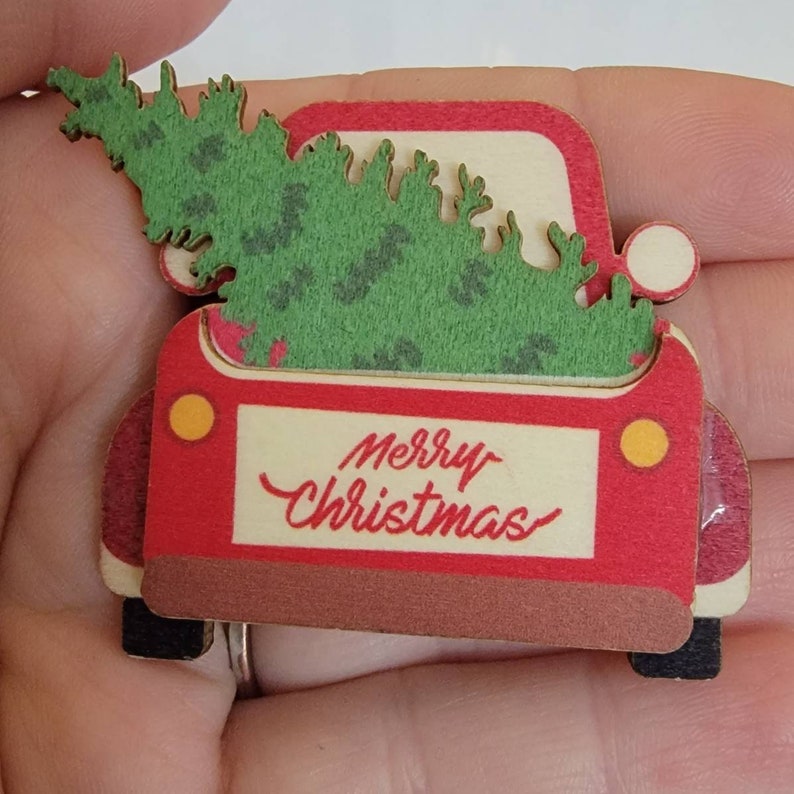 Red truck with tree in back MERRY CHRISTMAS Red truck with tree in back MERRY CHRISTMAS