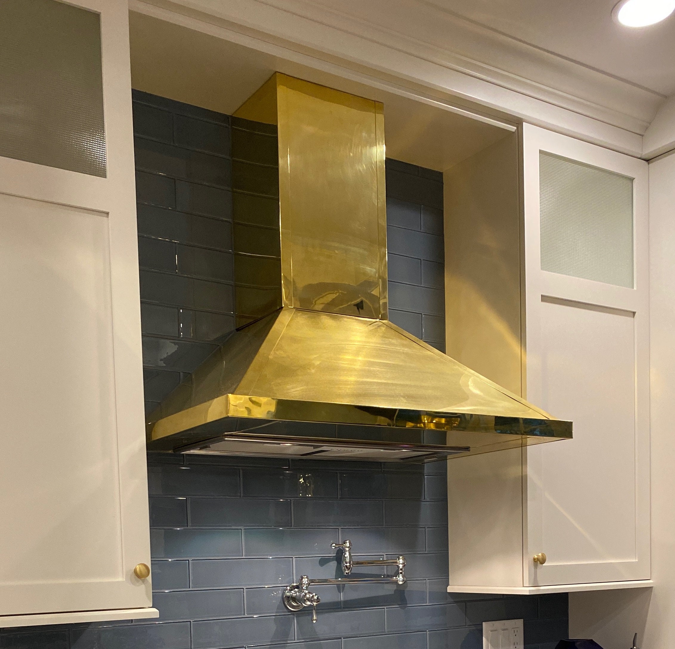 Brass shop kitchen hood