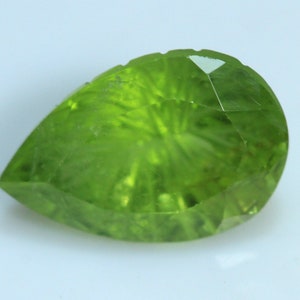 3.87 Carats! Natural Peridot Carving. 12x8 MM Pear Shape. Green Color. Pakistan Origin. Earth Mined Stone. Sparkling Gem. Loose Gemstone.