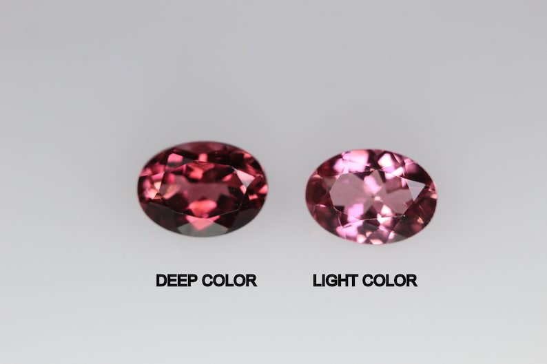 May include: Two oval-shaped gemstones, one deep pink and one light pink, labeled "DEEP COLOR" and "LIGHT COLOR".