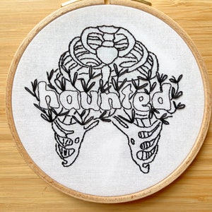 Handmade calligraphy embroidery hoop inspired by Haunted SN