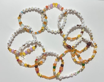 Braccialetti dell'amicizia ispirati a Taylor Showgirl TLOAS