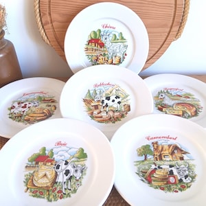 RZADKI Zestaw sześciu fantazyjnych francuskich zabytkowych talerzy do sera PILLIVUYT z białej porcelany w stylu kreskówkowym - zwierzęta i słynne sery