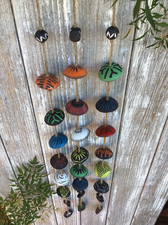 Wind Chime. Elegant Black Clay, Colourful and Carved Pottery. Bare