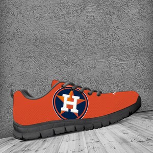 Orange astros clearance converse