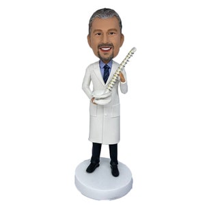 Handmade Polymer Clay Surgeon bobblehead holding a spine model,Medical Gift,Funny office decor,Cute Medical Figure,Gifts for Doctors&Nurses