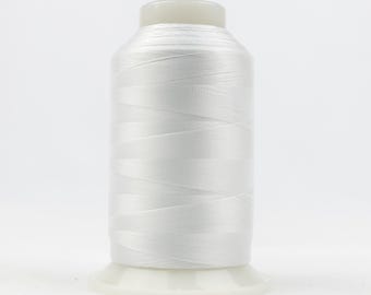 May include: A spool of white thread for sewing or embroidery.