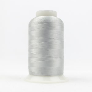May include: A spool of silver embroidery thread.