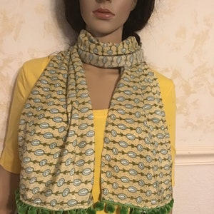 Brand New  Scarf with Shades of Green/Blue  Trailing Bow with Rabbit. Handmade .Size 59” x 19”.. Beautiful Scarf.