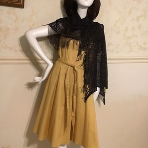 Brand New  Black and Gold Scarf with Fringe Elegant Rich Size 62” x 32”.