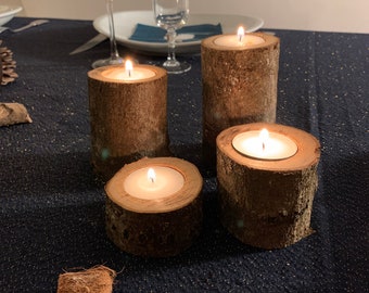 Set of 4 raw wood candlesticks