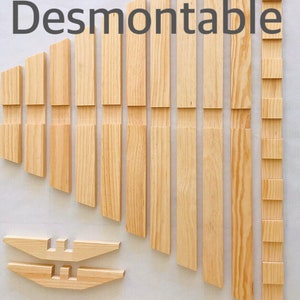 May include: A set of wooden pieces for building a chair. The pieces are labeled "Detachable/Desmontable". The pieces are all natural wood color.