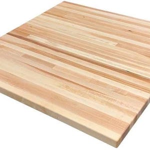 May include: A natural wood butcher block countertop with a light brown finish. The countertop is made of multiple strips of wood that are arranged in a horizontal pattern.