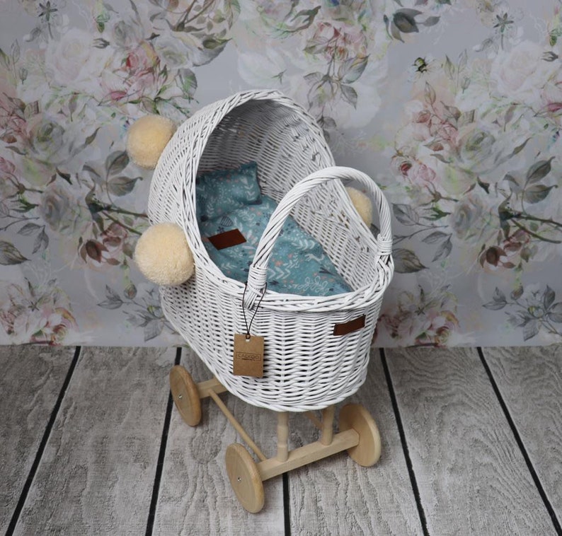 white wicker dolls pram