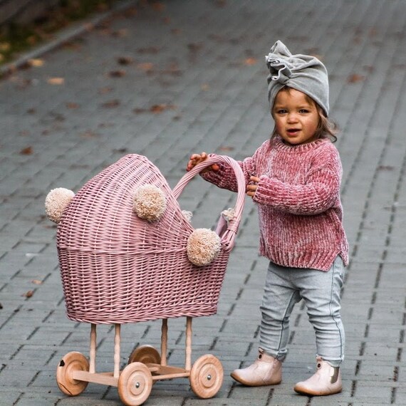 pink wicker pram