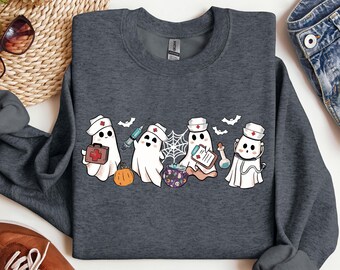 Ghost Nurse Halloween Sweatshirt, Halloween Nurse Shirt, Halloween Sweatshirt, Happy Halloween Shirt, Halloween Nurse Gift, Cute Nurse Shirt