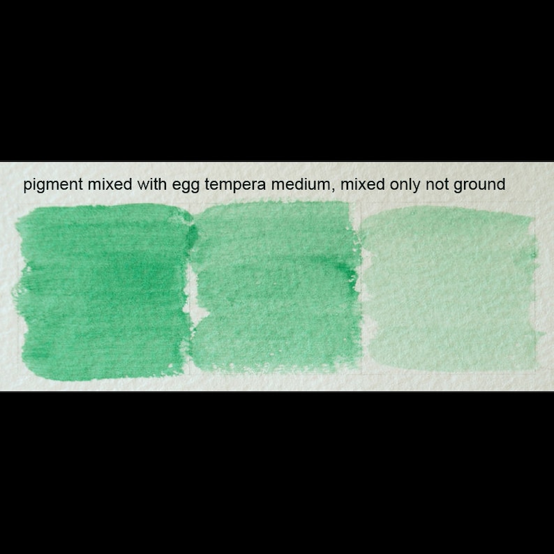 May include: Three swatches of green paint, mixed with egg tempera medium. The text "pigment mixed with egg tempera medium, mixed only not ground" is above the swatches.