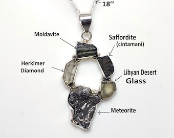 May include: A silver necklace with a pendant featuring a circle of various stones, including Moldavite, Herkimer Diamond, Libyan Desert Glass, and a meteorite. The necklace is 18 inches long.