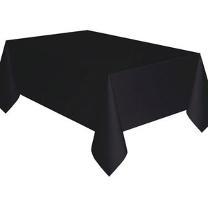May include: A black plastic tablecloth. This tablecloth is perfect for parties, events, and everyday use.