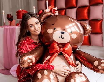 座っているテディベアとリボンのホイルバルーン（34インチ）