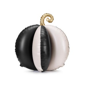 May include: A black and white pumpkin-shaped balloon with a gold stem. The balloon is divided into three sections, with the center section being black and white. The stem is a gold color and is curled at the top. This balloon is perfect for Halloween.