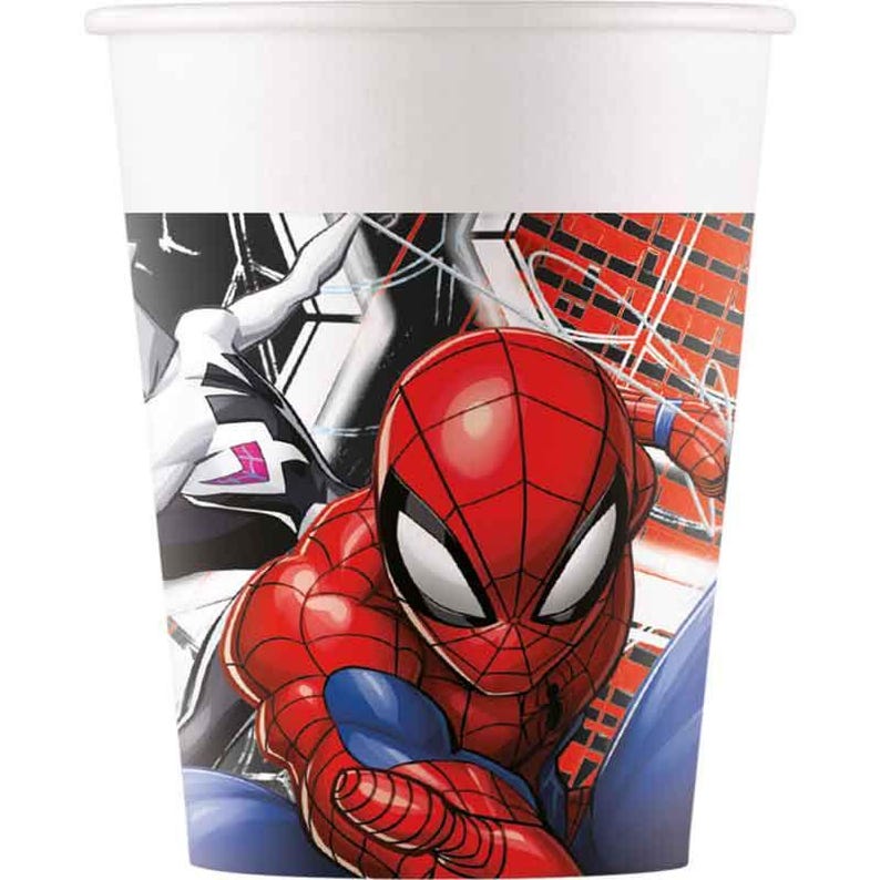 May include: White paper cup featuring a vibrant illustration of Spider-Man in his iconic red and blue suit. The design includes a close-up of Spider-Man's face and a background with web patterns and other characters.
